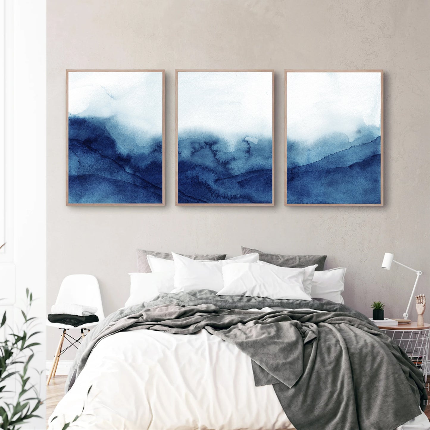 Watercolor wall art in bedroom.