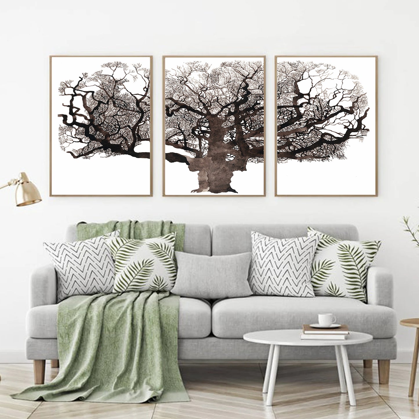 Watercolor oak tree wall art above the sofa.