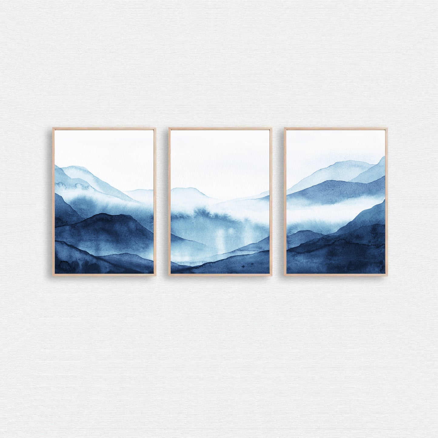 Dark blue watercolor art with foggy mountains.