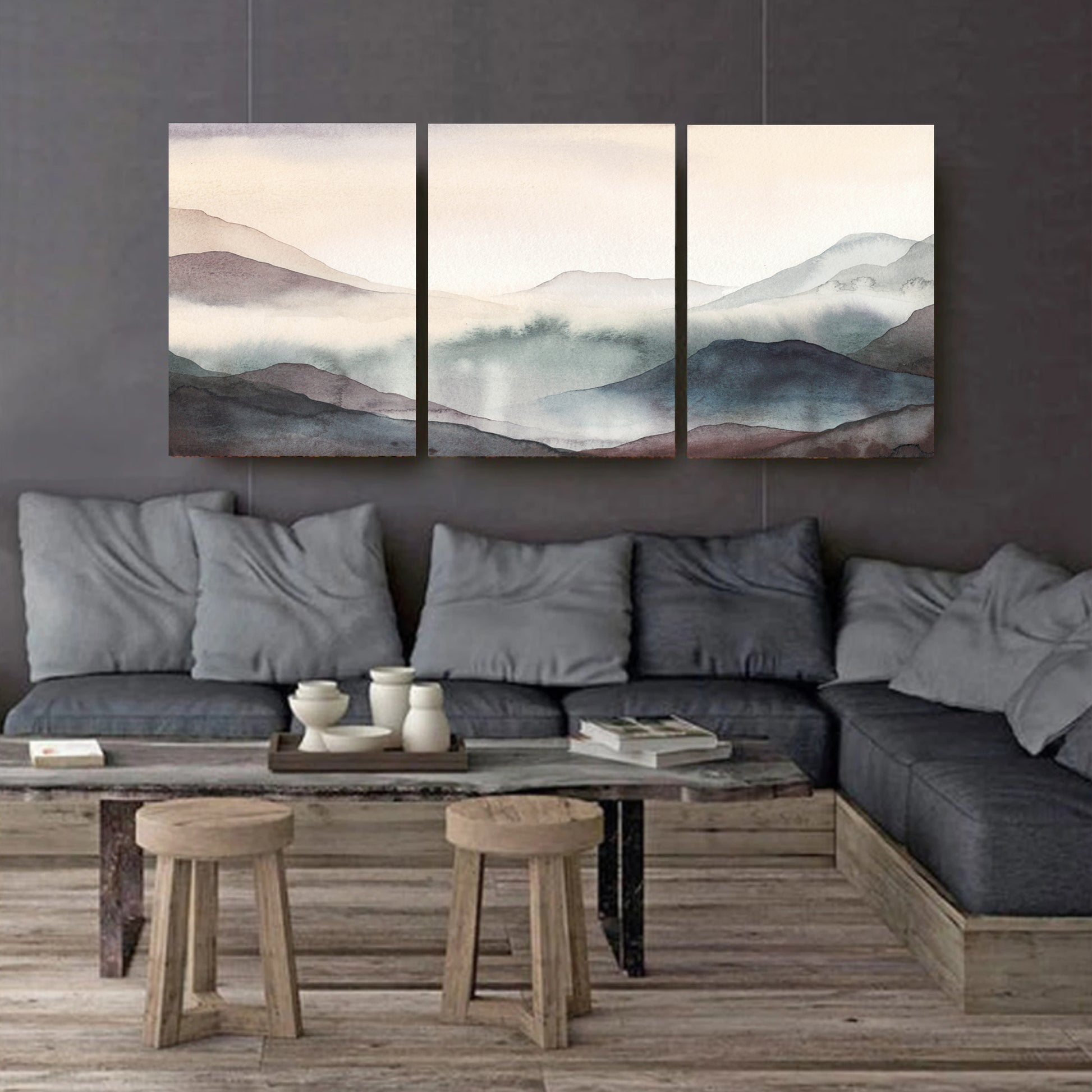 Mountain art set stretched canvas on dark wall.