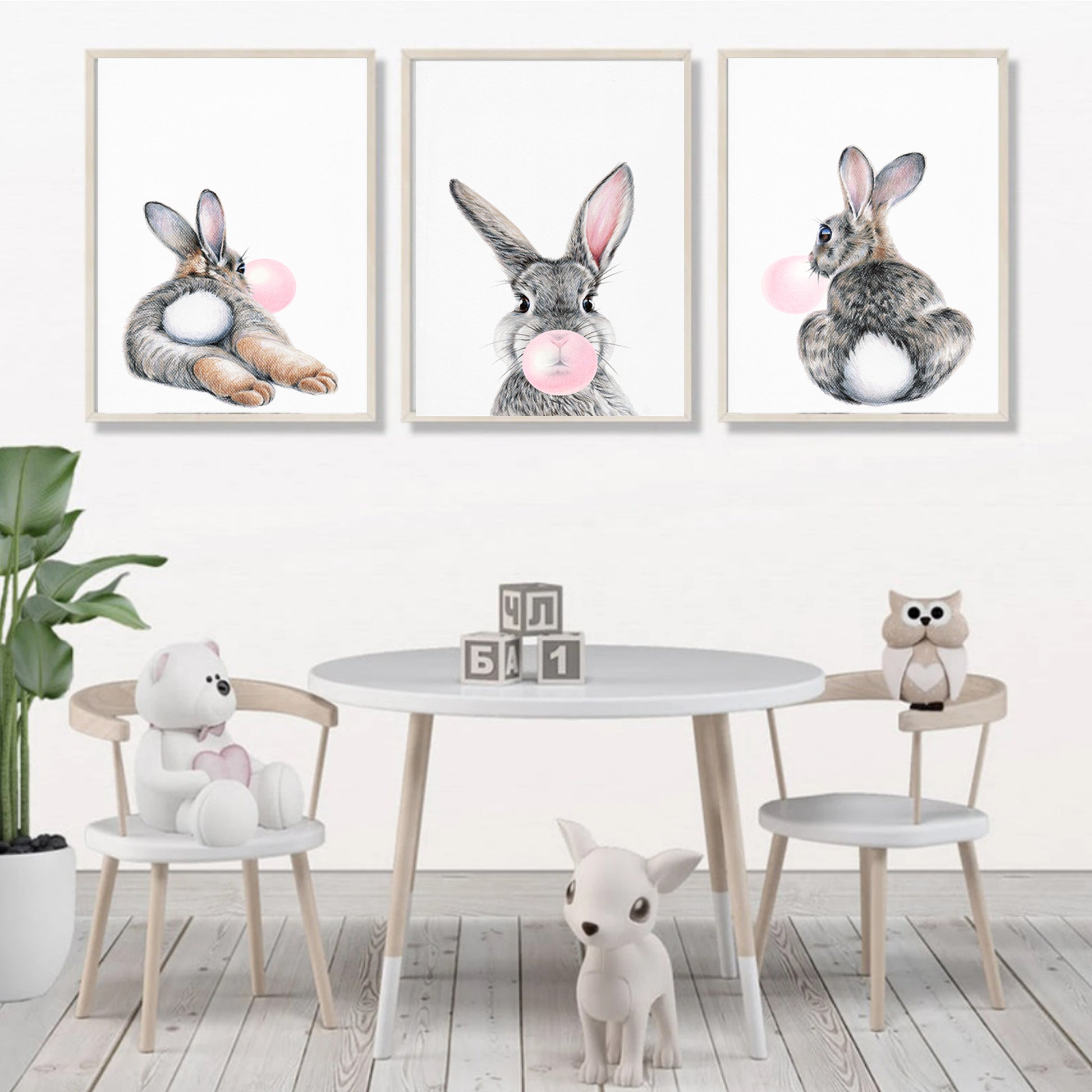 Nursery wall decor with three bunnies.